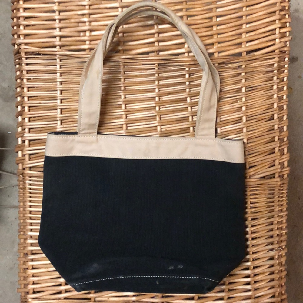 🎉closet clear out! Black and Tan canvas bag